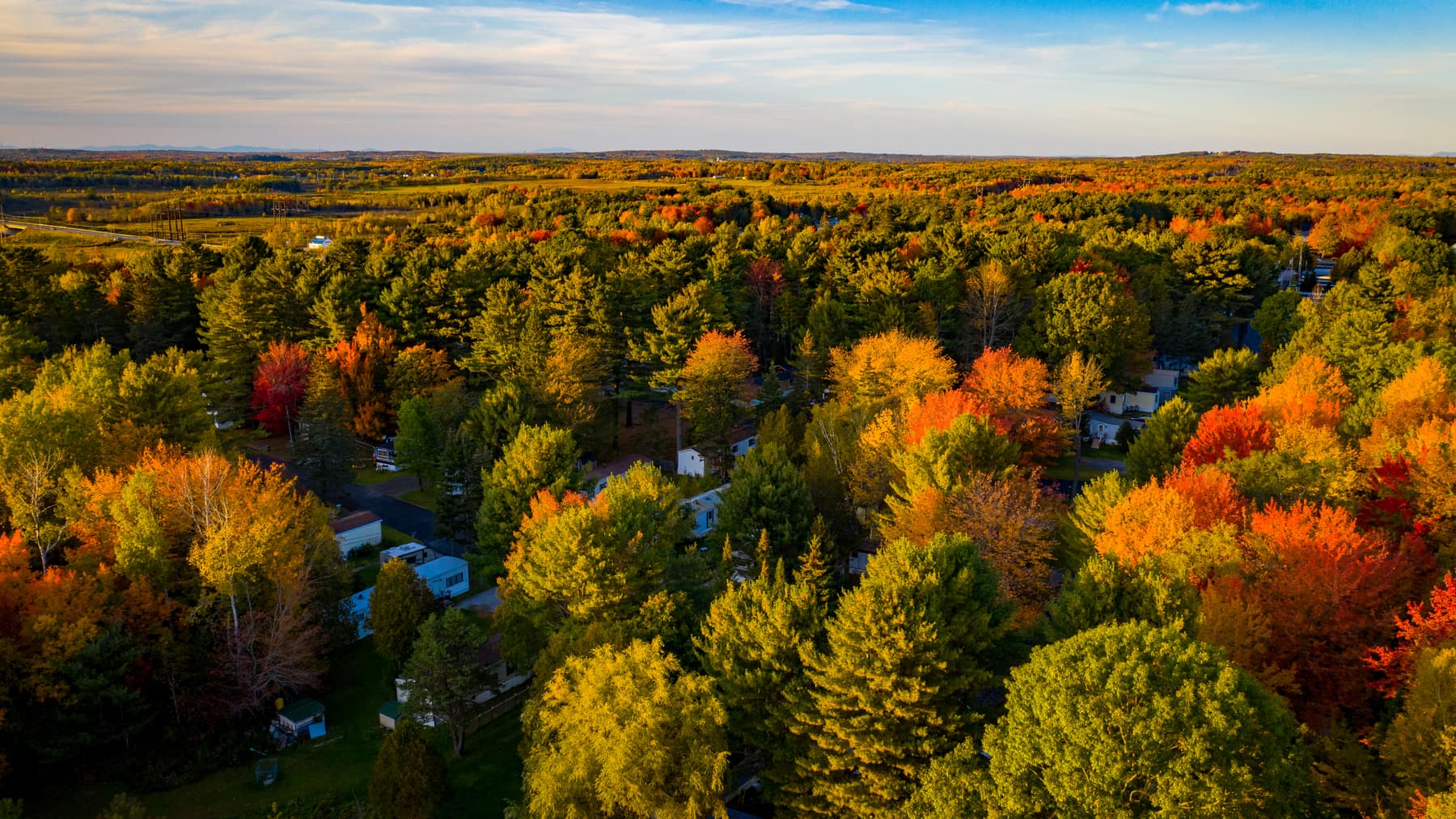 Sweeping aerial of the Penobscot River Valley in autumn